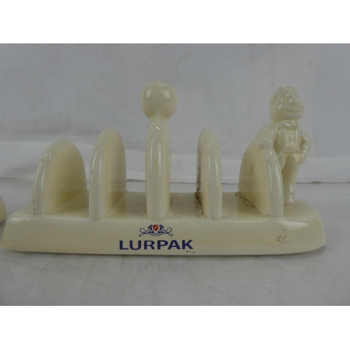 12 - A pair of Lurpak ceramic toast racks.