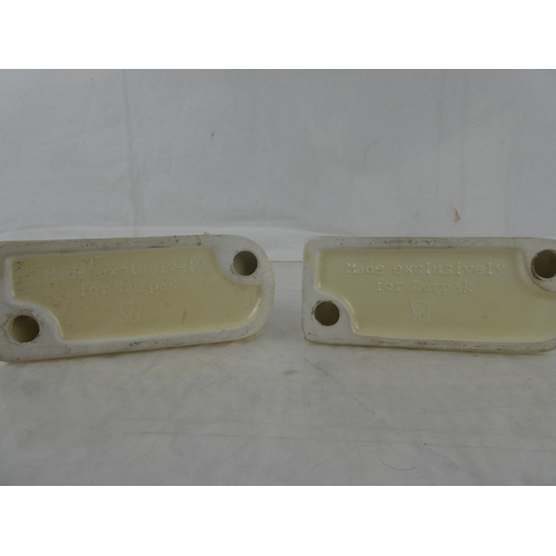 12 - A pair of Lurpak ceramic toast racks.