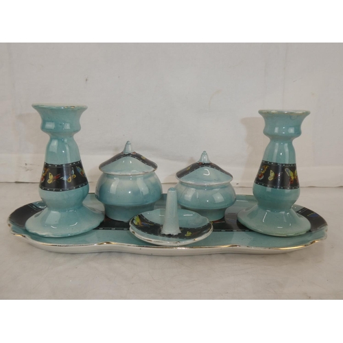 15 - A vintage blue and floral glazed dressing table set.