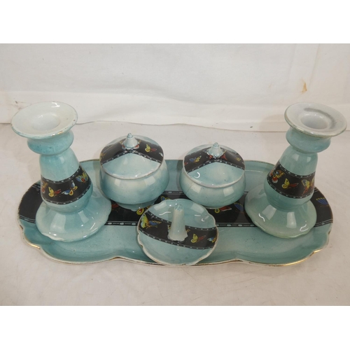 15 - A vintage blue and floral glazed dressing table set.