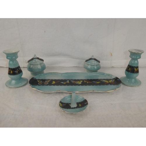 15 - A vintage blue and floral glazed dressing table set.