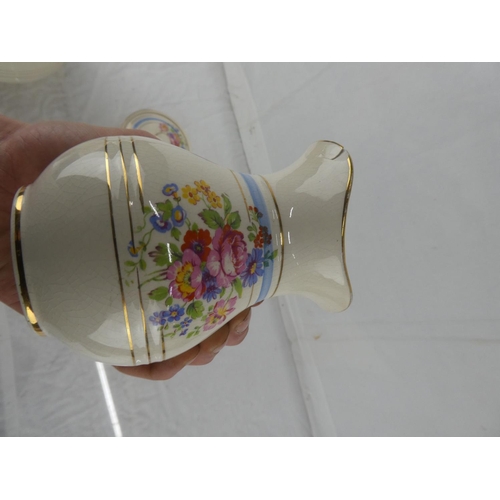 18 - A three piece Flacon Ware floral patterned wash jug set.