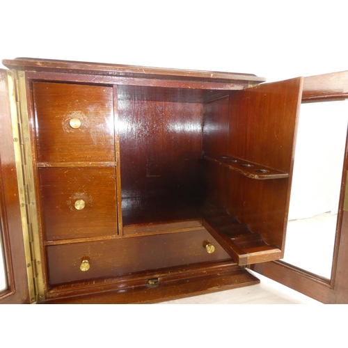 21 - An inlaid mahogany smokers cabinet, measuring 12