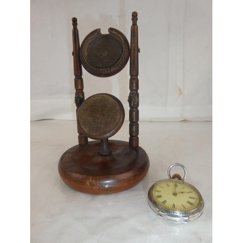 23 - A stunning antique wooden pocket watch holder and pin cushion, including a Sterling Silver pocket wa... 