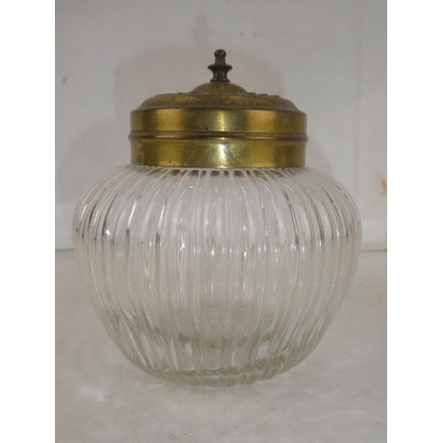 25 - A vintage glass 'Biscuit' jar with brass lid, measuring 6.5