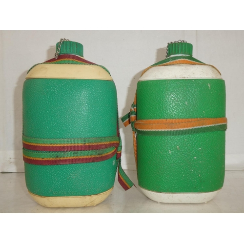 27 - Two vintage plastic 'Phoenix' water bottles.