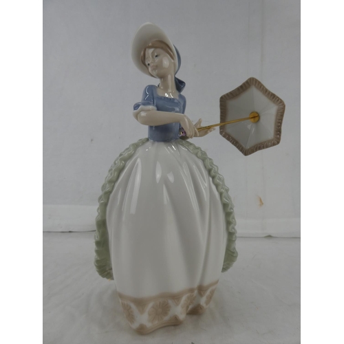 36 - A Nao figure, 'Girl with Parasol'.