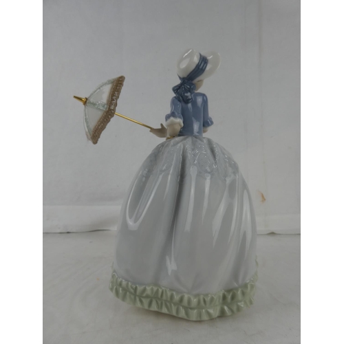 36 - A Nao figure, 'Girl with Parasol'.