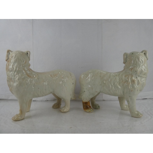 37 - A pair of antique Staffordshire mantle dogs. (a/f)