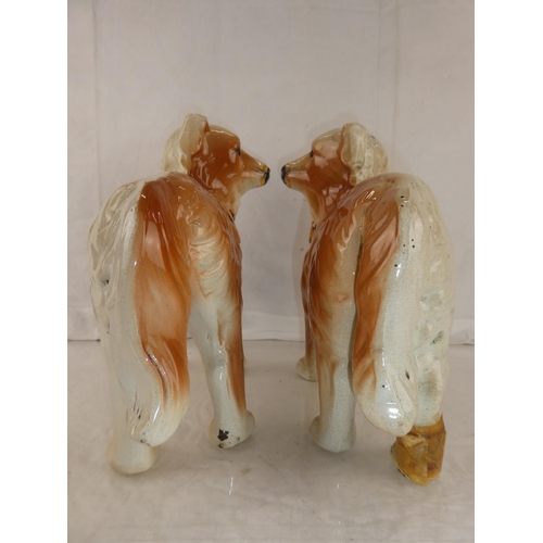 37 - A pair of antique Staffordshire mantle dogs. (a/f)