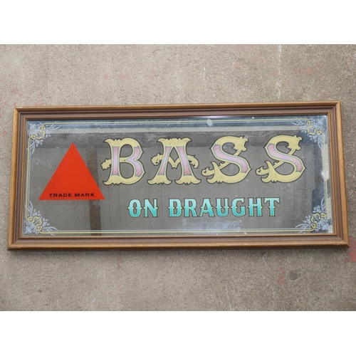 53 - A vintage 'Bass on Draught' pub mirror, measuring 36cm x 80cm.