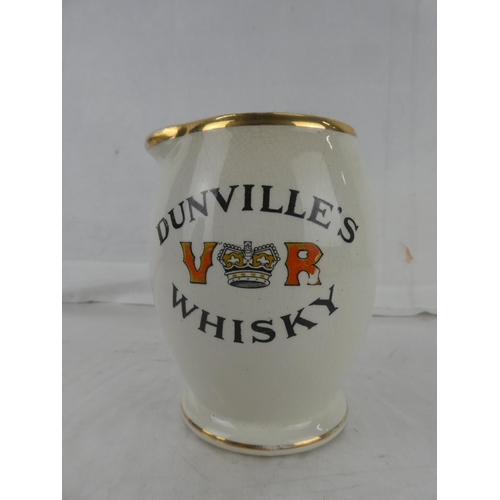 58 - A vintage J A Campbell, Belfast 'Dunville's VR Whisky - Ask For It and See You Get It' pub jug (a/f)... 