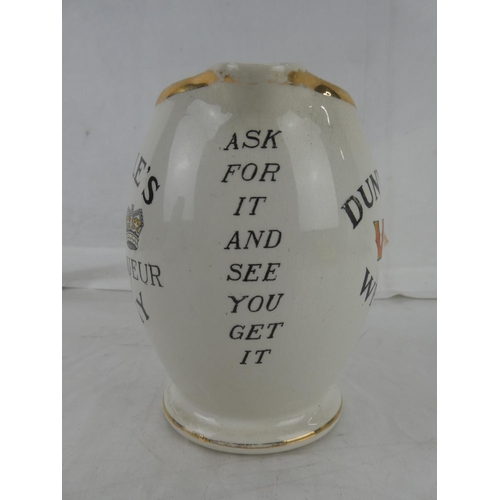 58 - A vintage J A Campbell, Belfast 'Dunville's VR Whisky - Ask For It and See You Get It' pub jug (a/f)... 