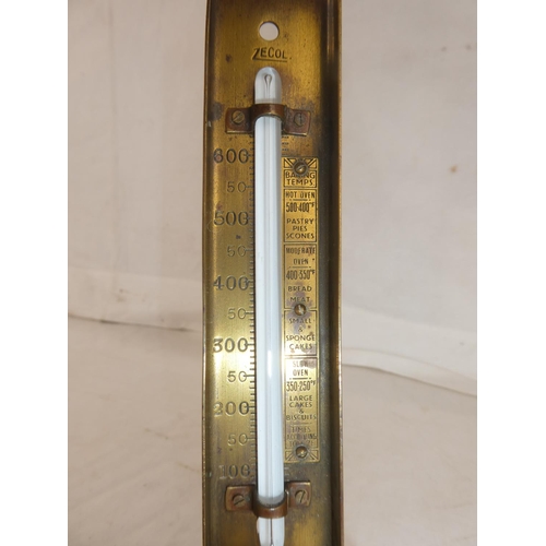 62 - An antique Zecol brass thermometer.