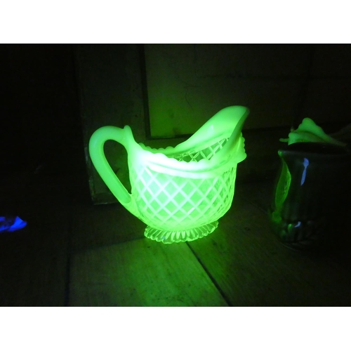 63 - A stunning Uranium glass milk jug and sugar bowl (a/f) and a miniature Sylvac 1993 pottery jug.