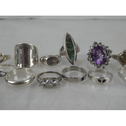 77 - A large collection of Sterling Silver rings.