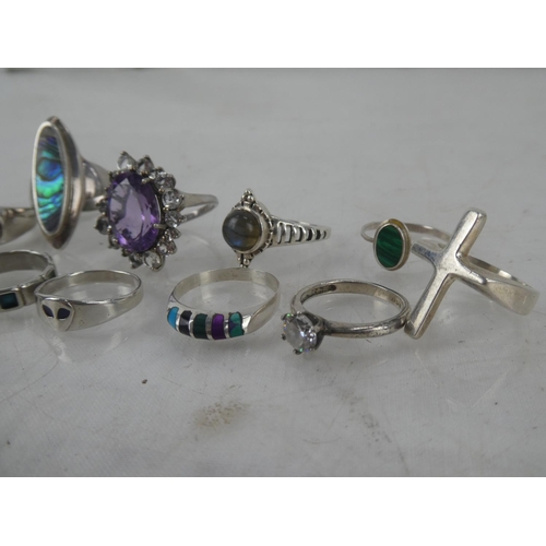 77 - A large collection of Sterling Silver rings.