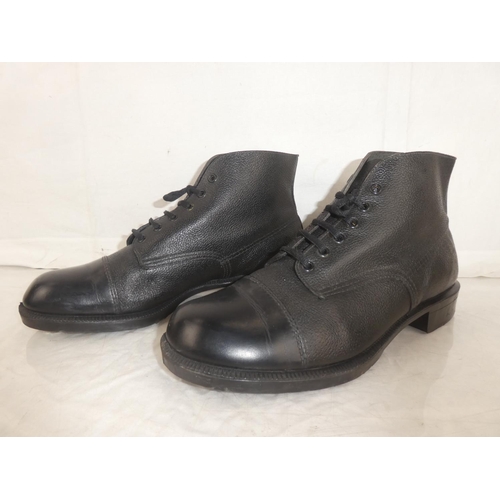 8 - A pair of UDR boots, size 10.