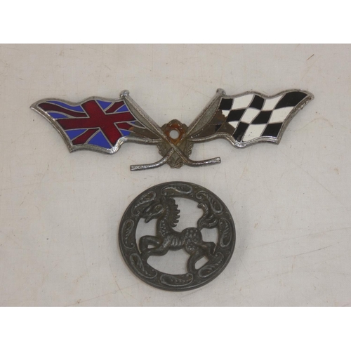 101 - A vintage enamel racing car emblem & antique style medal.