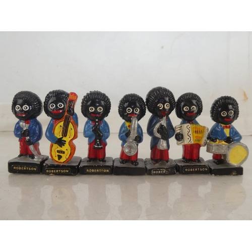 102 - A set of seven Robertson jam hand painted figures.