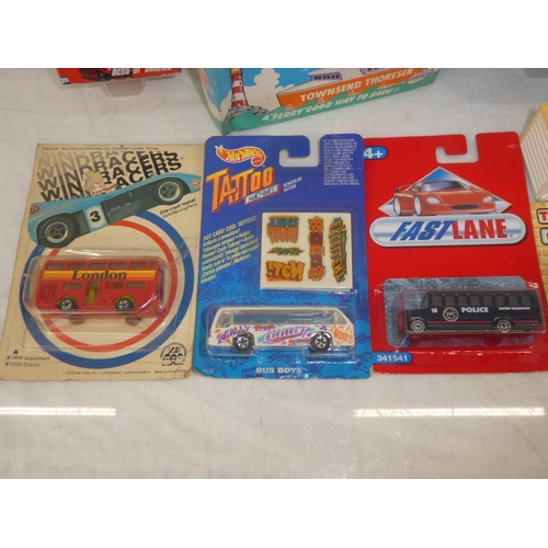 108 - A lot of vintage boxed collectors cars to include a Stena Line boat, Windracers London bus, an Ulste... 