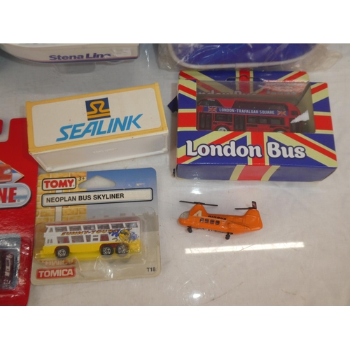 108 - A lot of vintage boxed collectors cars to include a Stena Line boat, Windracers London bus, an Ulste... 