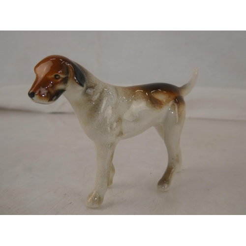 117 - A Beswick Hound dog (a/f) and three others.