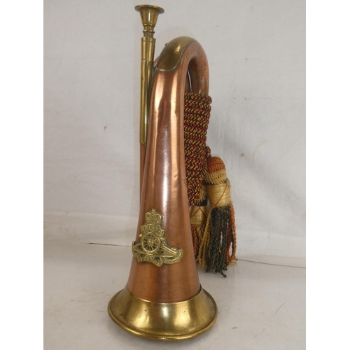 123 - A stunning Royal Artillery copper and brass bugle.