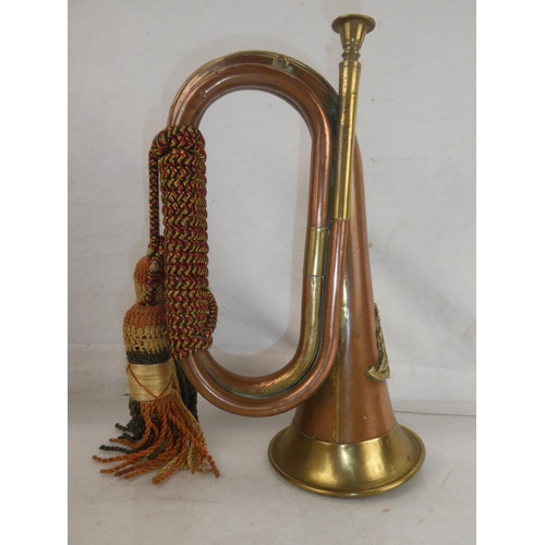 123 - A stunning Royal Artillery copper and brass bugle.