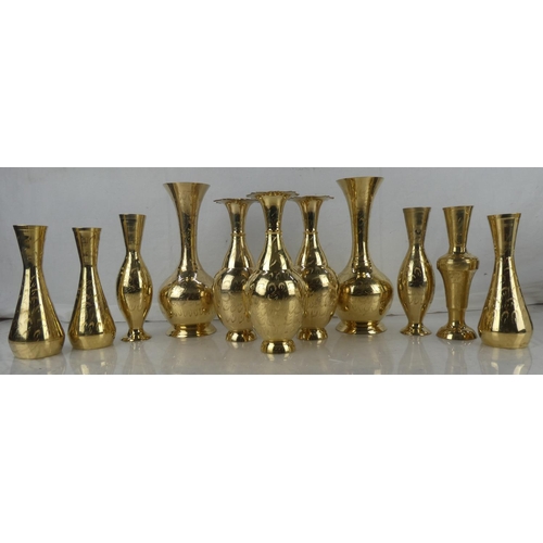 130 - A set of three and two vintage brass vases and more.