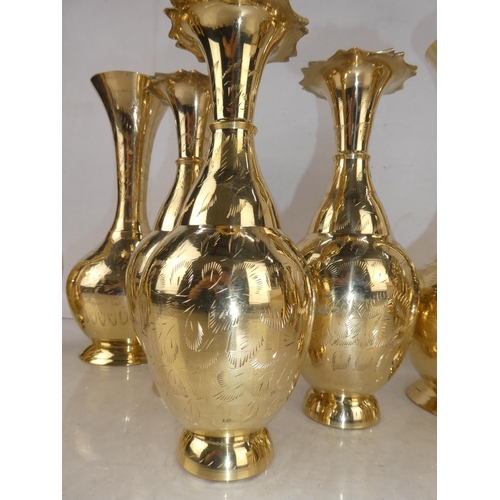 130 - A set of three and two vintage brass vases and more.