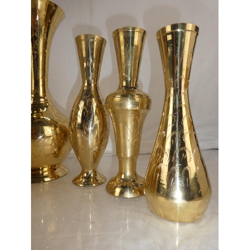 130 - A set of three and two vintage brass vases and more.