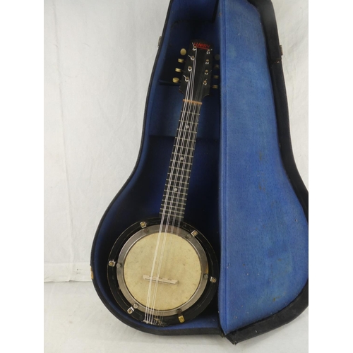 142 - A vintage cased 'Harry' eight string Banjo/Mandolin.