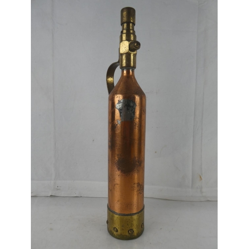 143 - A vintage brass and copper fire extinguisher, measuring 17