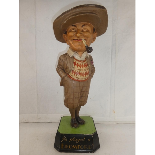 145 - A rare Bromford Man advertising golfing figure complete with pipe and mounted on original square bas... 