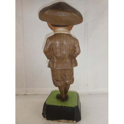 145 - A rare Bromford Man advertising golfing figure complete with pipe and mounted on original square bas... 