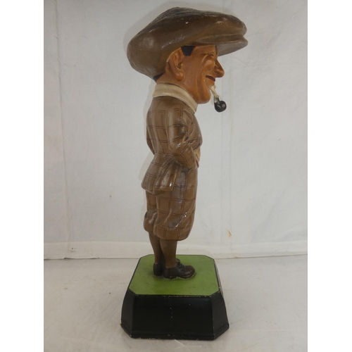 145 - A rare Bromford Man advertising golfing figure complete with pipe and mounted on original square bas... 