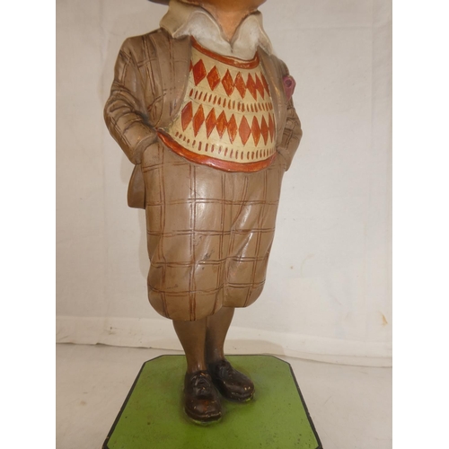 145 - A rare Bromford Man advertising golfing figure complete with pipe and mounted on original square bas... 