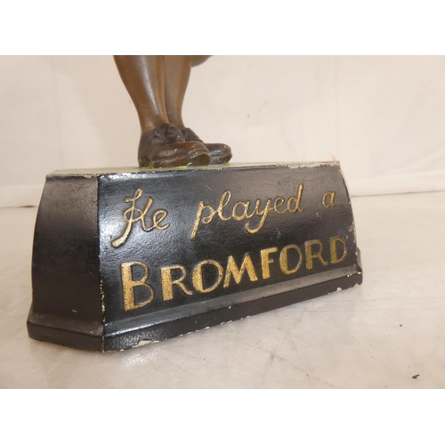 145 - A rare Bromford Man advertising golfing figure complete with pipe and mounted on original square bas... 