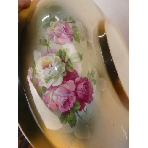 149 - An antique L & Son Ltd wash jug and bowl decorated with flowers.