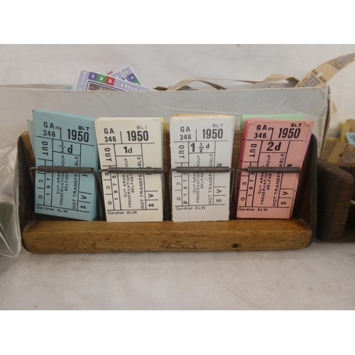 98 - A large collection of assorted tram and bus tickets and two wooden stands.