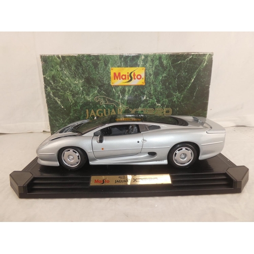 157 - A boxed Maisto 1992 Jaguar XC220 model car, box measuring 19.5