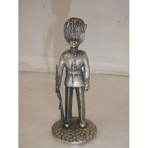 160 - A metal Meccano figure of a Grenadier Guardsman, measuring 11cm.