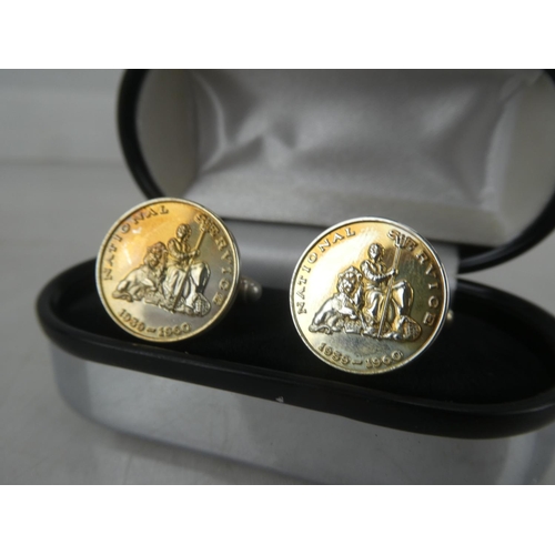 166 - A pair of Sterling silver 'National Service' cufflinks.