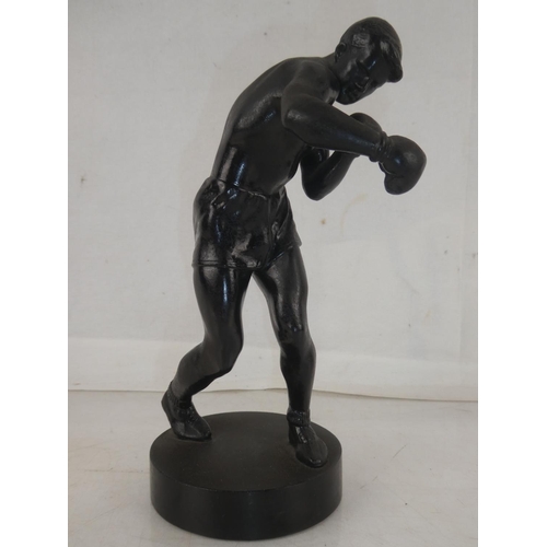 170 - A vintage spelter figure of a boxer dated 1963, measuring 22cm.