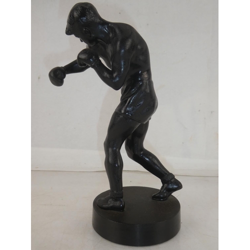 170 - A vintage spelter figure of a boxer dated 1963, measuring 22cm.