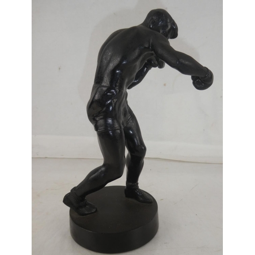 170 - A vintage spelter figure of a boxer dated 1963, measuring 22cm.