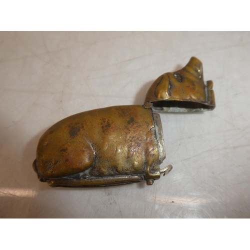 172 - An unusual antique novelty brass vesta case, modelled as a pig.