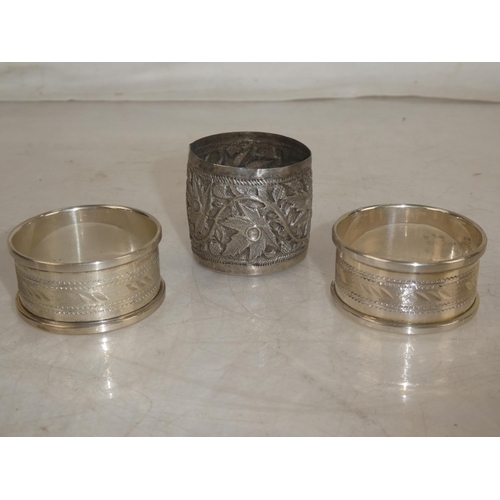 177 - Two Sterling Silver napkin rings and another.