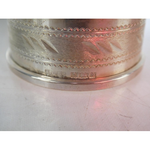 177 - Two Sterling Silver napkin rings and another.